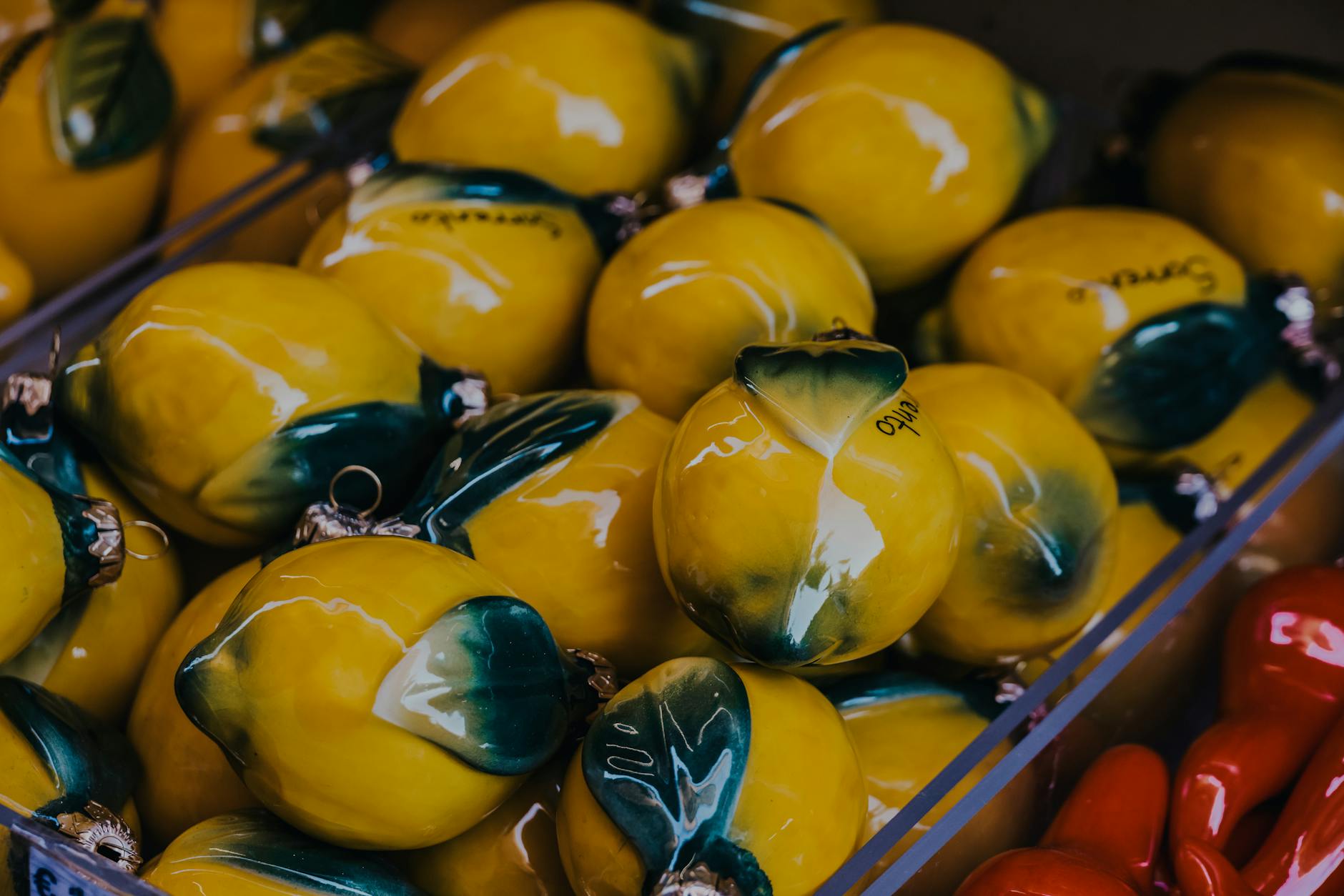 Vibrant yellow ceramic lemons artfully displayed, symbolizing the precision and clarity of lemon vibrator intensity